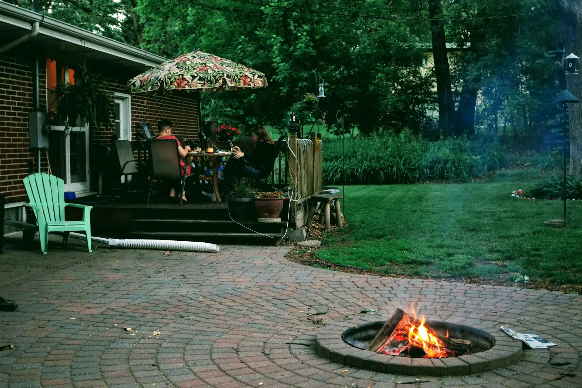 Fire pits & outdoor living project by Froio's Lawn & Landscape